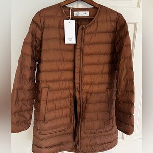 Herschel Supply Company Women's Tan Puffer Jacket. New without tags. Never worn